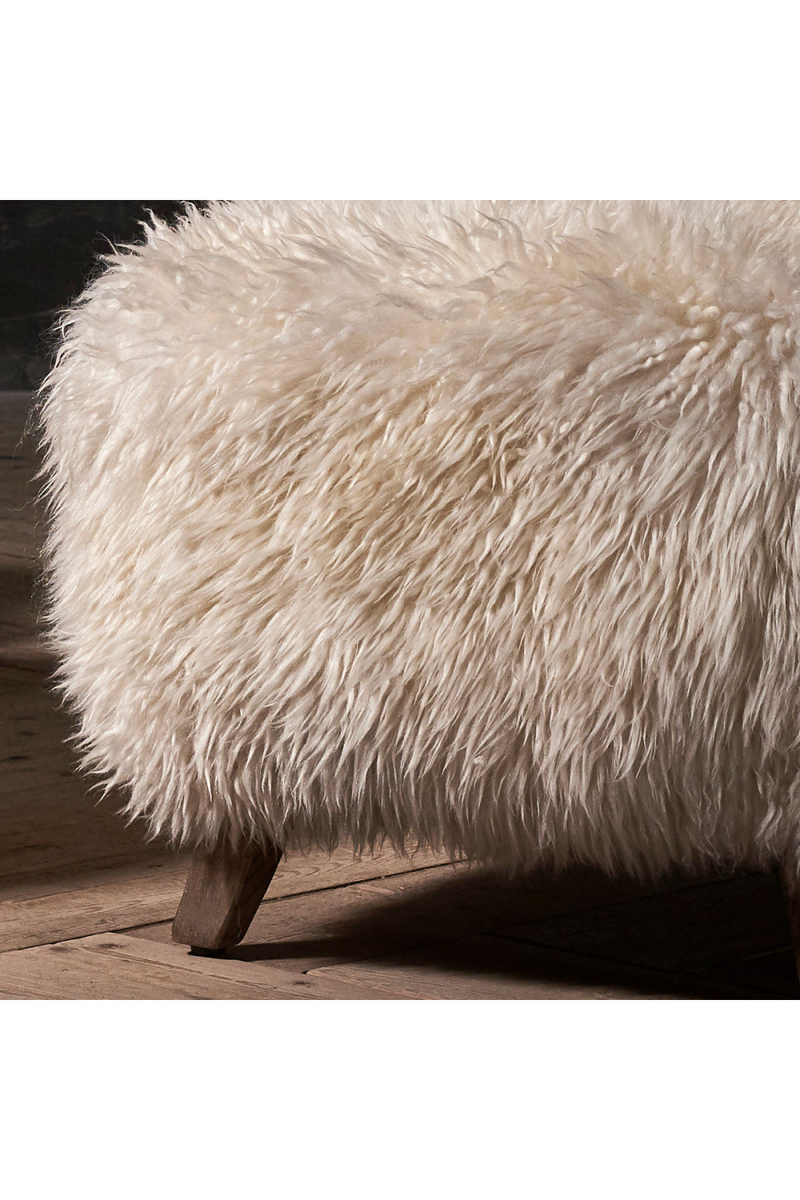 Long-Haired Sheepskin Footstool | Andrew Martin Cabana | Oroatrade.com