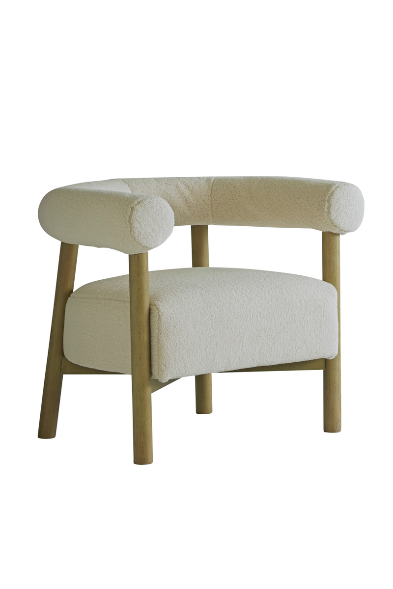 Cream Sheepskin Curved Armchair | Andrew Martin Rollo | Oroatrade.com