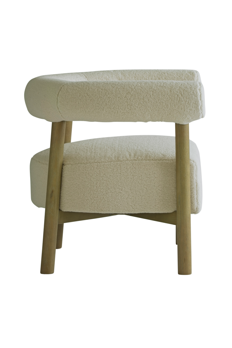 Cream Sheepskin Curved Armchair | Andrew Martin Rollo | Oroatrade.com