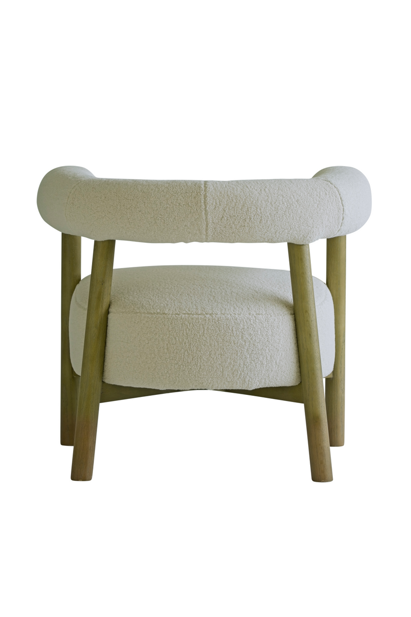 Cream Sheepskin Curved Armchair | Andrew Martin Rollo | Oroatrade.com