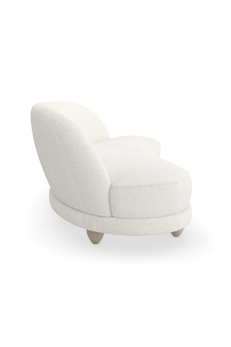 Bouclé Serpentine Sofa | Caracole Tulum | Oroatrade.com