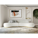 White Curved Sofa with Beige Pillows | OROA Modern Frontier