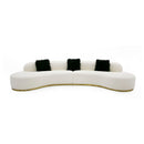 White Curved Sofa with Black Pillows | OROA Modern Frontier