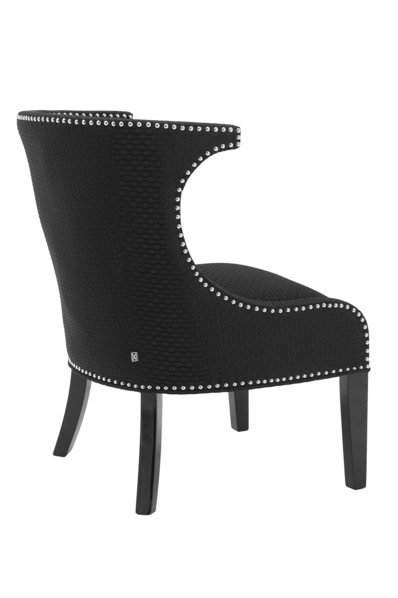 Black Studded Wing Chair | Eichholtz Elson | Oroatrade.com